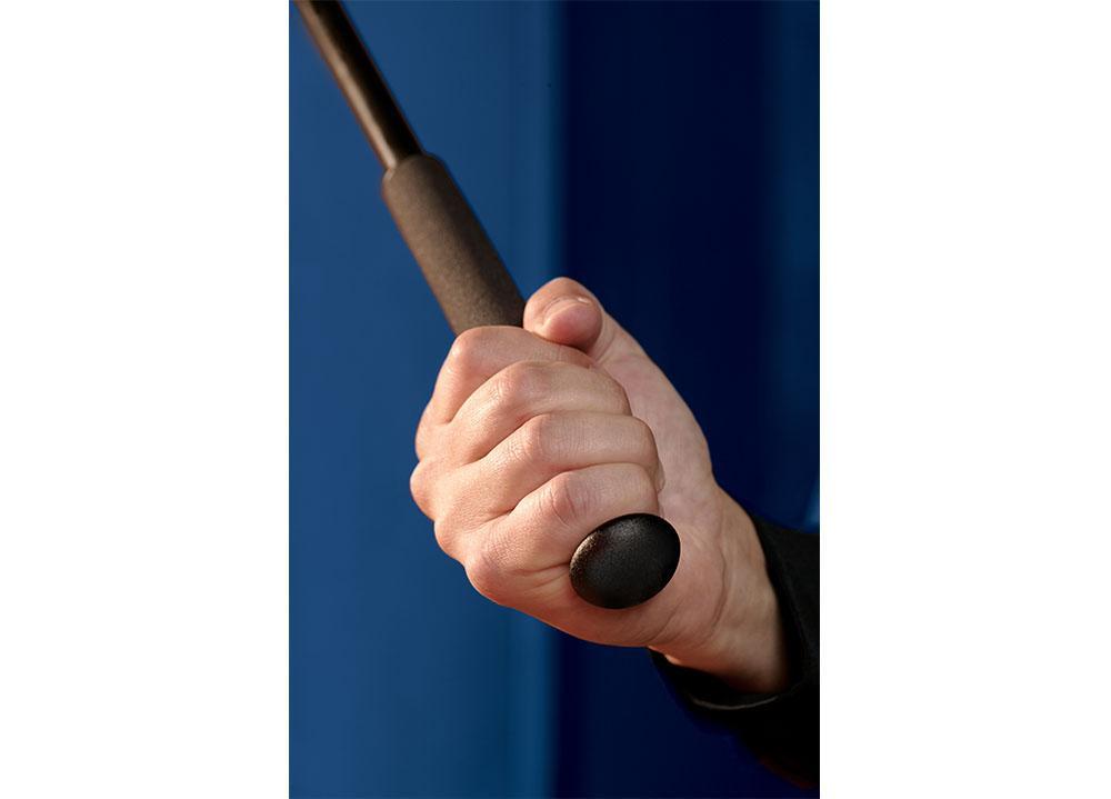 Leverage Cap for Friction Loc Batons in hand on baton